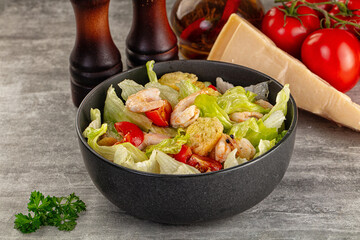 Tasty caesar salad with prawn