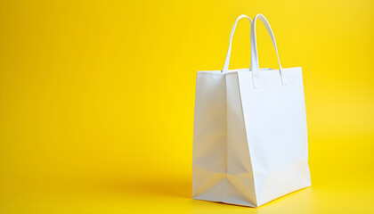 A white paper bag on a yellow background.