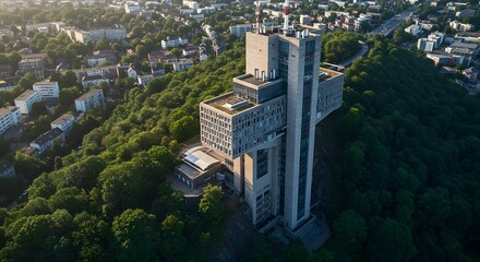 Obraz premium Tower on Hill Surrounded by City and Trees