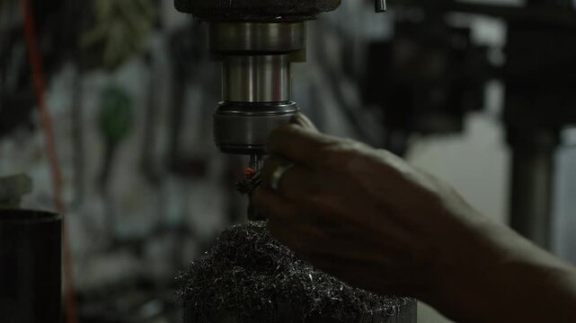 VDO 4K Lathe is working on turning metal parts for industrial use.