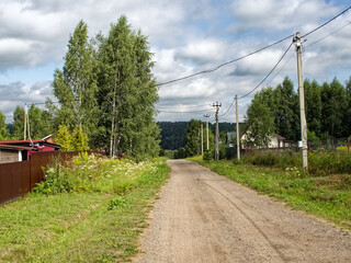 Dirt road in a holiday village in summer