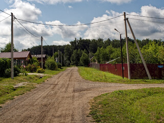 Dirt road in a holiday village in summer