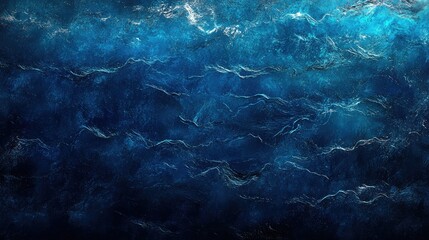 Obraz premium Deep Blue Ocean Surface with Gentle Waves Lit by Sunlight, Capturing the Serenity and Motion of Natural Water Patterns in a Stunning Underwater Atmosphere