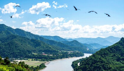 Birds flying over mountain ranges and rivers, vibrant and harmonious nature background