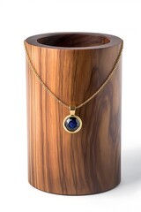 Wooden container with a blue stone pendant inside