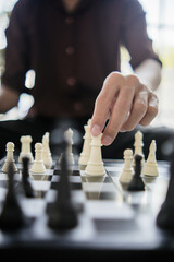 Businessman moving chess.business strategy ideas concept Plan leading strategy of successful business competition