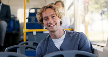 Commute, nurse and portrait with man on bus for journey or travel to healthcare job. Internship, Scrubs and smile with happy medical professional in vehicle for public transportation to work © peopleimages.com