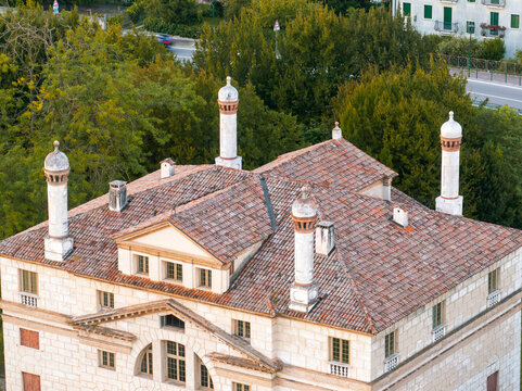 Historical Renaissance Villa Foscari La Malcontenta aerial drone view near Venice Italy, countryside mansion estate, surrounded farmlands, green nature, famous architecture, cultural tourism. Travel