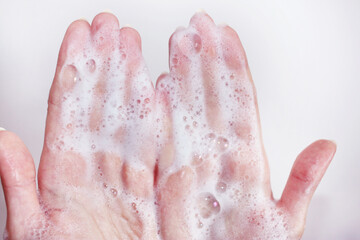 Soap, soap foam. Hands in foam, Hands in soap. Hand washing. Foam for washing.
