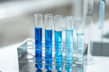 Chemical laboratory glassware with blue liquid samples in test tubes, scientific research experiment, biotechnology innovation, pharmaceutical analysis development, medical diagnostics