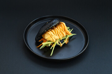 Assorted bao buns with vegetables, shrimp, nuggets, and fish fillings served on a black plate over a black background. Asian street food concept, modern restaurant menu style.