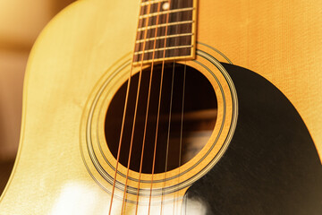 close-up of an expensive-looking acoustic guitar	
