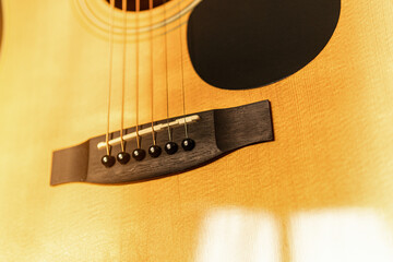 close-up of an expensive-looking acoustic guitar	
