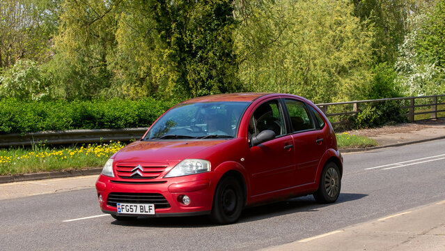 Milton Keynes,Bucks.,UK - April 27th 2025:  2007 red Citroen C3  car on an English road.