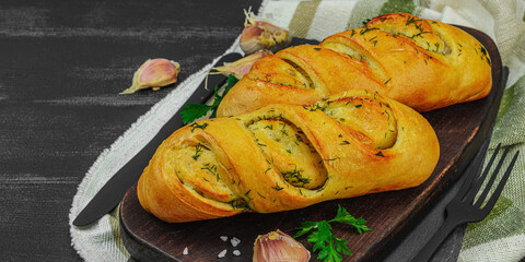 Fresh baked garlic bread, gluten free buns. Tasty food, fresh parsley, fragrant spices