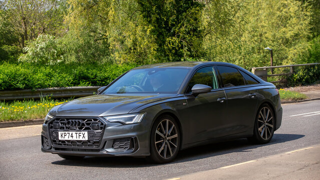 Milton Keynes,Bucks.,UK - April 27th 2025:  2024 Audi A6 s ln blk ed 40 tfsi  car on an English road.