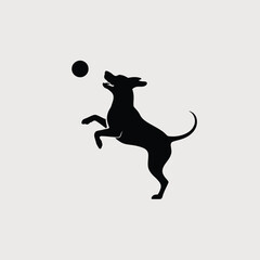 Silhouette of Playful Dog Catching a Ball