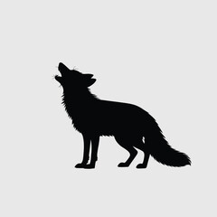 Silhouette of a Fox Howling at the Moon