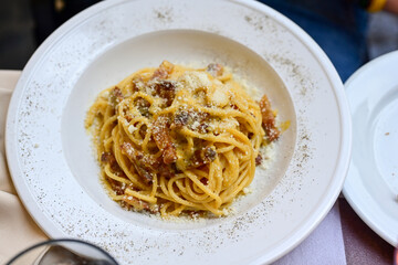  Fresh pasta   spaghetti cacio e pepe and Aperol Spritz  at  typical italian resaturant at Trastevere   neighbourhood at Rome 