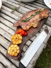 Close up Steak on wood plate.