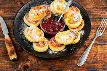 Cottage cheese fritters stack, Syrniki.