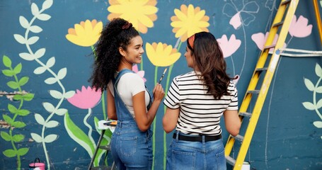 Conversation, women and painting mural for wall, ladder or community project with artistic expression. People, outdoor or friends with creativity, volunteer or diy decor with flowers or student hobby