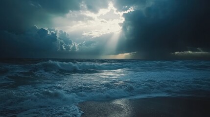 Obraz premium Dramatic ocean waves crashing on beach, sun rays pierce dark clouds