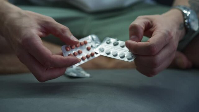 Allergy pill.
Allergy sufferer taking allergy pills.
Medicine on the couch.
Itchy skin from severe allergy.
Medicine use.
Drug, treatment