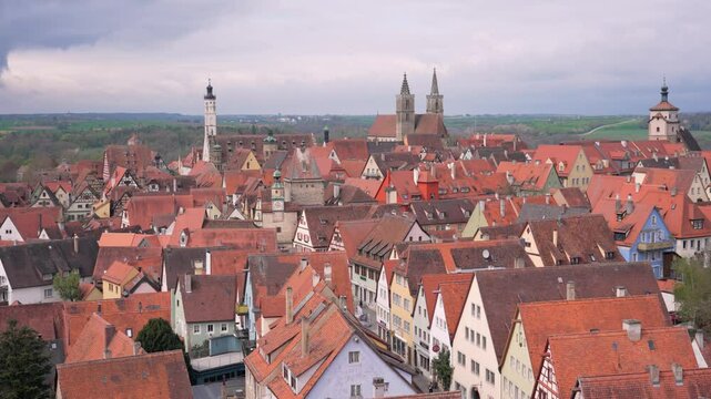 Rothenburg ob der Tauber in Bavaria, Germany. Camera slowly move and show  colorful rooftops and historic architecture. 