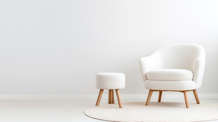 Modern minimalist white armchair and stool in a light room