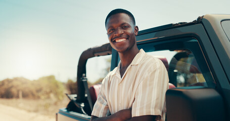 Road trip, portrait and arms crossed with black man in nature for safari guide, national park and travel adventure. Smile, explore and savannah with person and care in Tanzania for Serengeti reserve