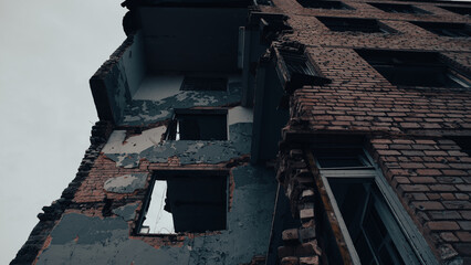 destroyed and burned houses in the city in Ukraine