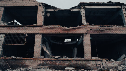destroyed and burned houses in the city in Ukraine