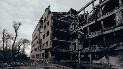 destroyed and burned houses in the city in Ukraine