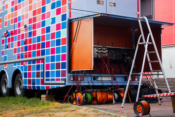 Mobile Television Studio Equipment and Cables in a Truck Preparing for an Outdoor Live Event...