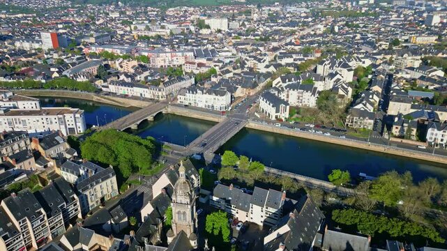 Amazing drone view of Sarthe River crossing the beautiful Le Mans city with Saint Benoit church of Le Mans and Pont Perrin, France.