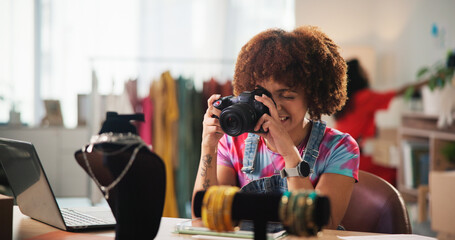 Woman, photographer or home with camera for jewelry business, fashion or digital marketing. Female person, freelancer or designer with technology for online startup, content creation or advertising