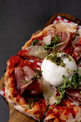close-up of a pizza with burrata