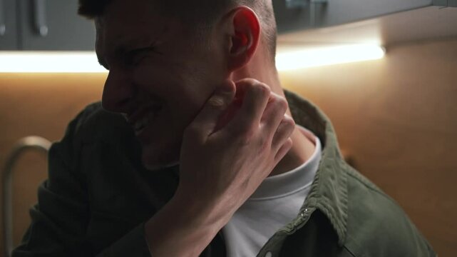 Mosquito bite.
Insect bite.
A man scratches his skin after an insect bite.
Mosquitoes and mosquitoes have bitten a man.
Mosquito bites cause discomfort to a man.
Poisonous insect bite