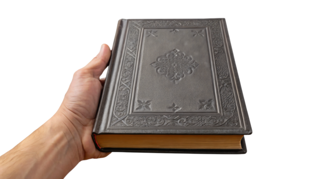 hand holding a magic book isolated on white