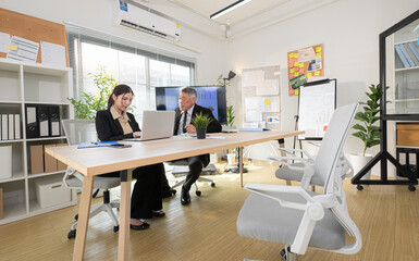 In a contemporary office, a group of senior executives with a mission to approve new projects