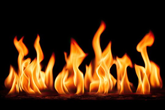 Fiery flames against black background