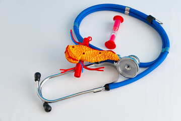 Healthcare and medical concept human pancreas and hourglass