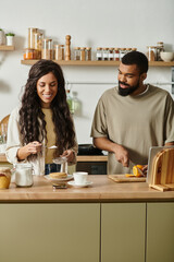 Loving couple enjoys a cozy morning together while preparing breakfast at home