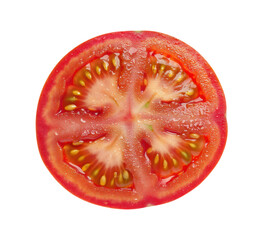 Freshly sliced tomato showcasing vibrant red color and juicy seeds