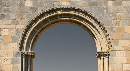 Fototapeta premium Medieval stone archway, detailed construction, on a wall