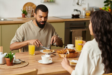 Joyful couple enjoys cozy breakfast together in their warm and inviting kitchen