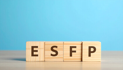 Wooden cubes with text ESFP. Personality type. Extraverted, Observant, Feeling, and Prospecting.
