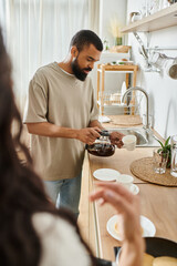 Cozy moments of love shared between a couple while preparing breakfast at home together
