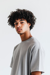 Obraz premium Young man wearing a loose gray sweatshirt. 